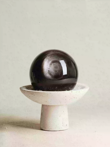 The Obsidian Guardian: Crystal Sphere Sanctuary for Energy Harmony