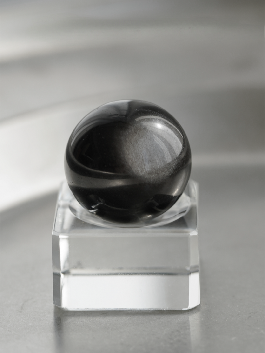 天然黑曜石水晶球摆件高级感创意家居卧室桌面洞石玄关装饰